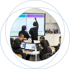 Children using a SMART Board in school
